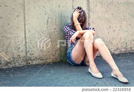 Closeup portrait of depressed teenager girl. Closeup portrait of depressed teenager girl. 22326958
