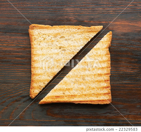 Toasts on wooden background 22329583