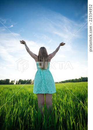 Happiness woman stay outdoor under sunlight of 22334952