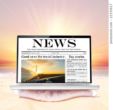 laptop on beach 22335617