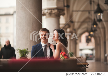 Wedding couple, man, girl sitting in cafe smiling 22340233