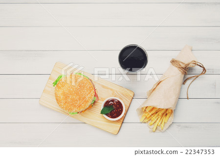 Burger, chips and cola at white wood Burger, chips and cola at white wood 22347353