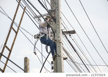 Electrician lineman repairman worker at climbing Electrician lineman repairman worker at climbing 22355824