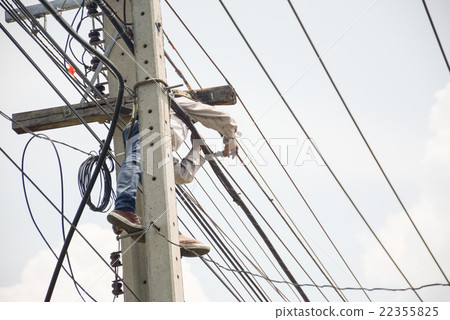 Electrician lineman repairman worker at climbing Electrician lineman repairman worker at climbing 22355825