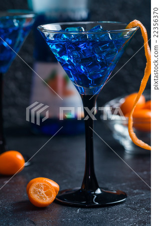 Blue cocktail in martini glasses Blue cocktail in martini glasses 22356370