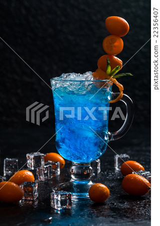 Blue cocktail in martini glasses 22356407