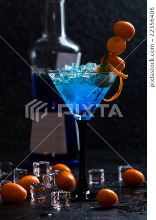 Blue cocktail in martini glasses 22356408