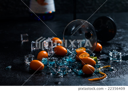 Blue cocktail in martini glasses 22356409