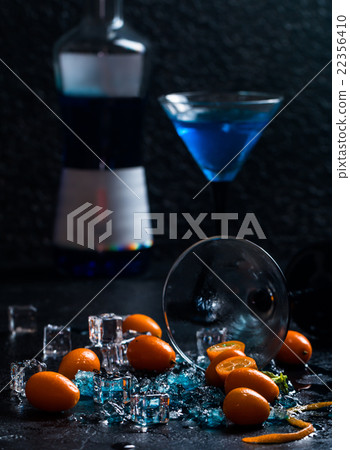 Blue cocktail in martini glasses Blue cocktail in martini glasses 22356410