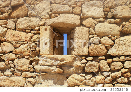Window in old stone wall ruins Window in old stone wall ruins 22358346