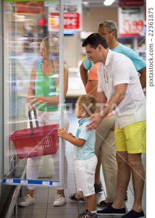 Family choosing food in supermarket 22361875
