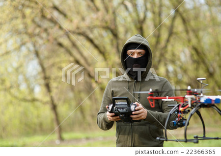 Man flying with the drone Man flying with the drone 22366365