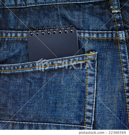 Note book in a back pocket of a jeans 22366569