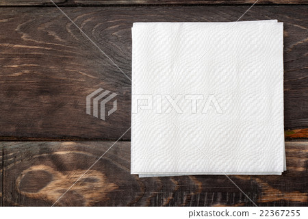 Paper napkins on wooden surface Paper napkins on wooden surface 22367255