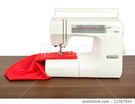 Sewing machine and red fabric isolated on white 22367843