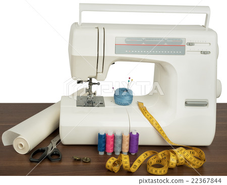 Sewing machine on table in workshop Sewing machine on table in workshop 22367844