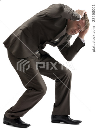 Frustrated businessman holding his head 22368001