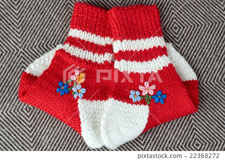 Pair of wool red knitted socks 22368272