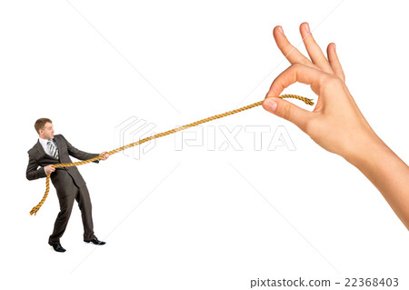 Businessman pulling rope against big woman hand Businessman pulling rope against big woman hand 22368403