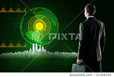 Business man stands near virtual screen with city Business man stands near virtual screen with city 22368504