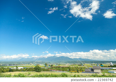 View of Tokachidake mountains from Nakafurano in Hokkaido 22369742
