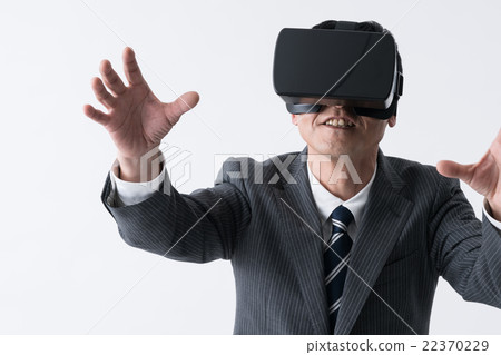 Male with VR / head mounted display Male with VR / head mounted display 22370229
