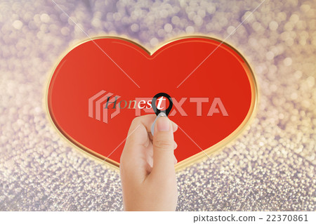 Isolated hand with lens and text honest with red heart shape on Isolated hand with lens and text honest with red heart shape on 22370861