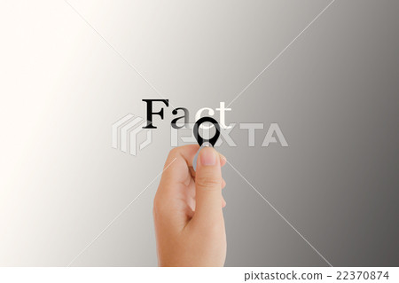 Isolated hand with lens and text fact on light platinum backgrou Isolated hand with lens and text fact on light platinum backgrou 22370874