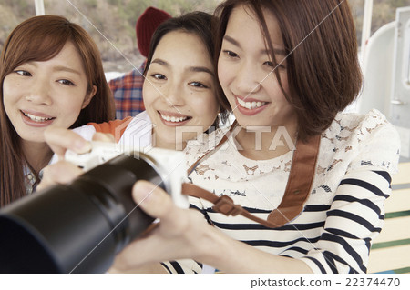 A woman enjoying traveling A woman enjoying traveling 22374470