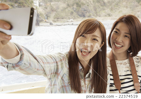 A woman enjoying traveling 22374519