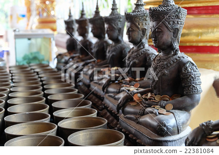 Angel statue and monk's alms bowl Angel statue and monk's alms bowl 22381084