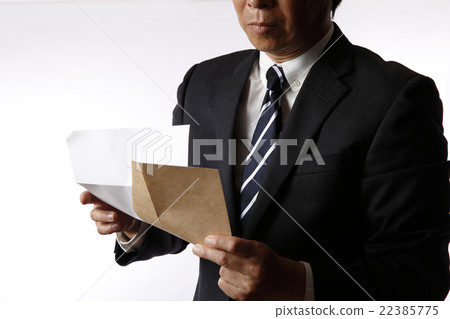 A businessman reading a letter 22385775