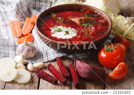 Ukrainian borsch and ingredients on the table Ukrainian borsch and ingredients on the table 22385885