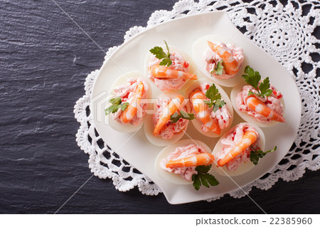 eggs stuffed with shrimp on a plate. top view 22385960