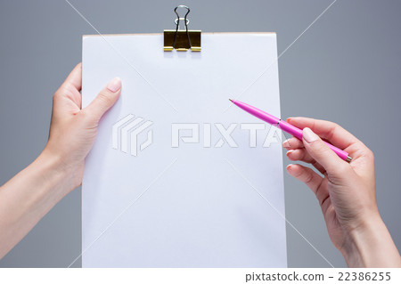 The notepad and pen in female hands The notepad and pen in female hands 22386255