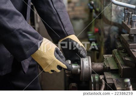 worker in protective gloves 22386259