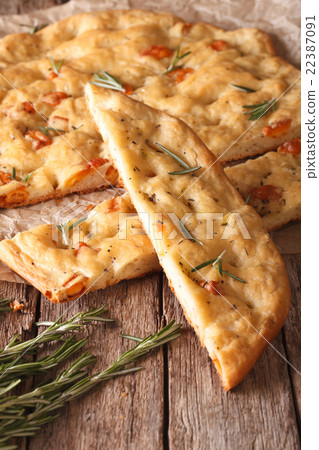 Traditional Italian focaccia with rosemary closeup 22387091
