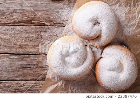 Spanish ensaimada pastries with berries 22387470