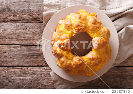 Tasty monkey bread with cheese on a plate Tasty monkey bread with cheese on a plate 22387530