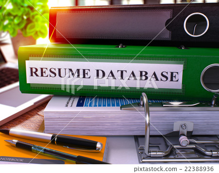 Resume Database on Green Ring Binder. Blurred 22388936