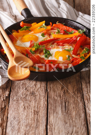 Typical Basque piperada with eggs in a frying pan 22389106