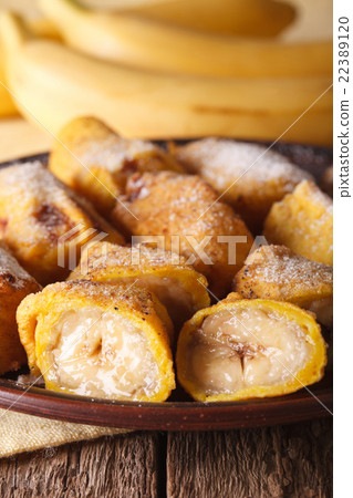 Pisang goreng fried bananas in batter on a plate 22389120