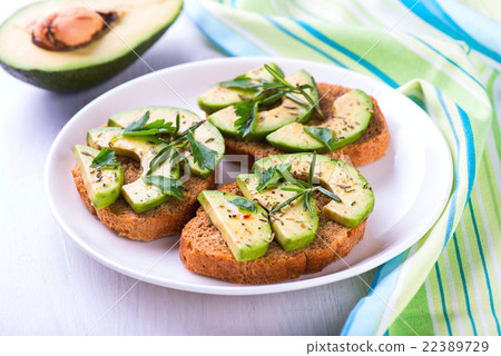 Toast with rye bread, avocado and herbs Toast with rye bread, avocado and herbs 22389729