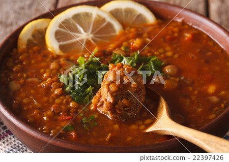 Moroccan soup Harira in a bowl macro. Horizontal Moroccan soup Harira in a bowl macro. Horizontal 22397426