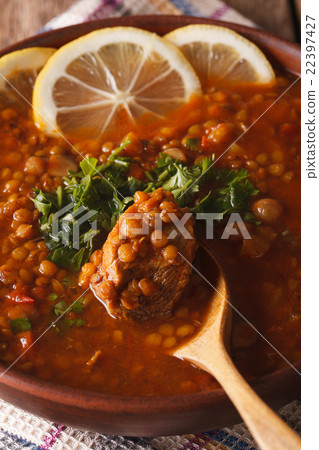 Moroccan soup Harira in a bowl macro. vertical Moroccan soup Harira in a bowl macro. vertical 22397427
