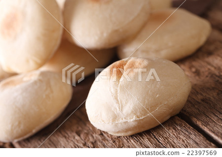 Freshly baked Arabic bread batbout macro Freshly baked Arabic bread batbout macro 22397569