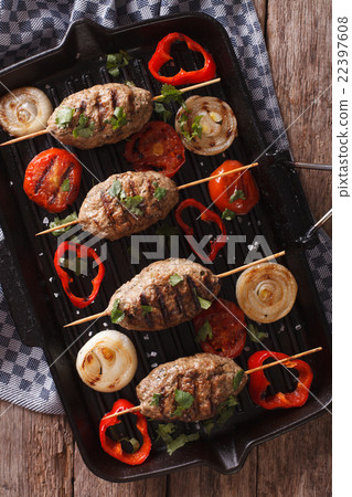 kebab with grilled vegetables on the grill pan 22397608
