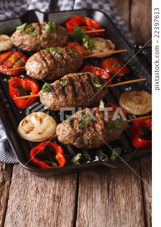 Arabian kebab with grilled vegetables on the grill Arabian kebab with grilled vegetables on the grill 22397613