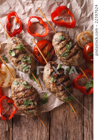 Turkish kebab with grilled vegetables close-up Turkish kebab with grilled vegetables close-up 22397624