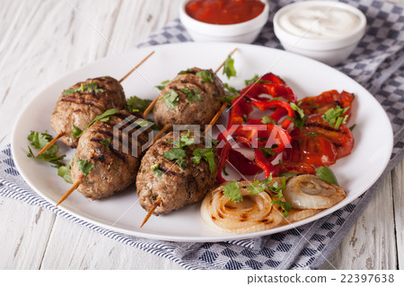 Tasty kofta kebab with grilled vegetables Tasty kofta kebab with grilled vegetables 22397638